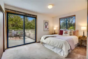 Bedroom #3 has access to the large deck and gardens.