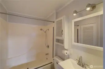 Next is main bath between first bedroom and kitchen