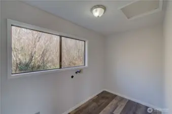 Laundry room that is very large / potential bathroom???