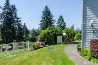 The backyard is a place to relax and enjoy the pastoral view.  There is a peek a boo marine view too.