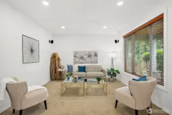 The formal living area is situated at the front of the home overlooking the front porch.