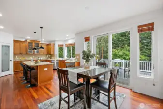 The Brazilian cherry hardwoods extend through the formal dining room, butlers pantry, kitchen and eating nook.