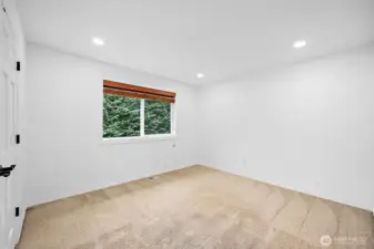 Bedroom 4 on the upper level features an en-suite/Jack & Jill bathroom.
