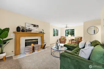Front room is quite large for a family room, gas fireplace