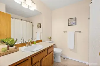Upstairs main bathroom is a good size, fresh paint, ready for your people!