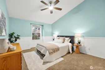 Principal suite is a lovely pop of soft teal revealing a nice retreat space