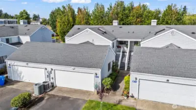 Lovely attached condo unit with no neighbors above. Two car garage plus driveway parking