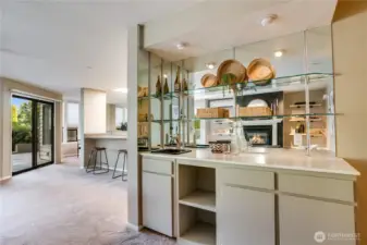 Built in bar with sink for entertaining and to showcase your favorite pieces.