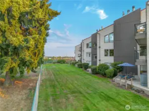 Beautiful green space surrounds these buildings, and a benefit of being on the ground floor means you can access easily