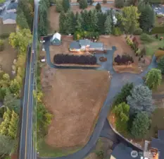 Arial view of entire acreage from Seward Rd to 146th Circle driveway and tree line is the east border and north border.