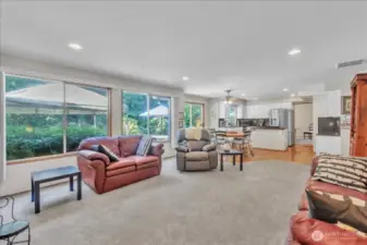 Spacious family room flowing into the kitchen for easy living and entertaining.