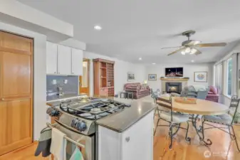 Enjoy a kitchen island and pantry overlooking a cozy family room.