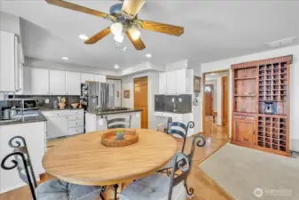 Bright filled breakfast nook, looking at the kitchen, toward the entrance or to the left is your dinning area.