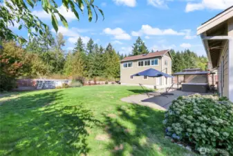 another angle of backyard and shop-living is upstairs