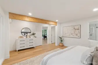 Primary suite features an ensuite bathroom on the main level