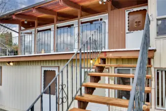 Two entrances. One to the lower level and the other up to the main level.