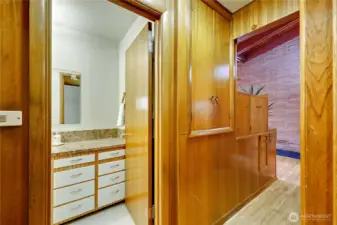 The entrance to the bathroom and 3rd bedroom.