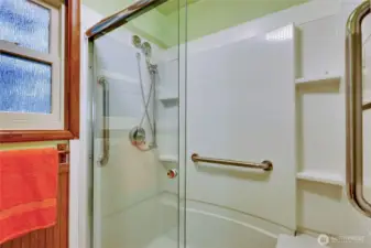 Bathroom has walk in shower.