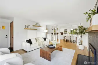 Open-concept living and dining space with abundant natural light in this Scenic Hill home.