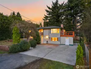 Long driveway and private setting provide extra parking and curb appeal in this Kent Washington home.