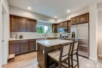 Beautiful cabinetry with plenty of counterspace.  All appliances stay!