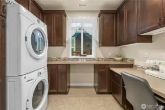 Functional Laundry Room with Work Area.