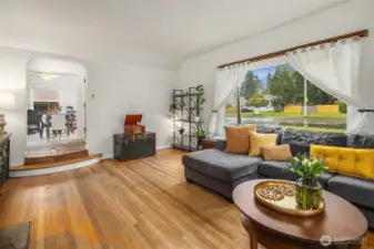 Newer extra-large South-facing windows provide abundant natural lighting.