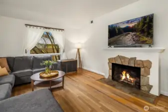 The central wood-burning fireplace is a nod to Spanish architecture