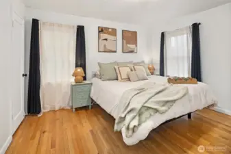 The primary bedroom is on the main floor and features two closets.