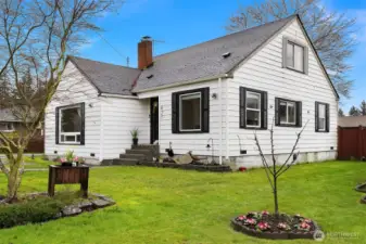 The home's front elevation by day.