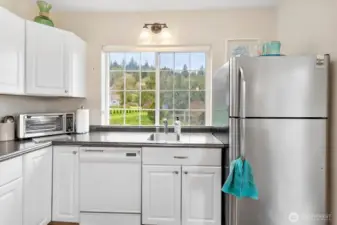 Full refrigerator, dishwasher and range