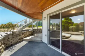 Nice covered patio for more summer gatherings right off the family/rec room on lower level!