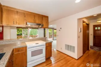 The hallway goes the front door and into the office bonus room on the left