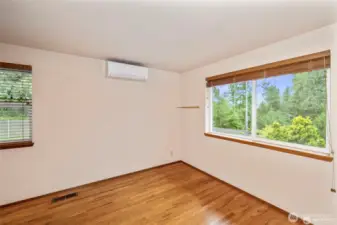 Going upstairs this southwest bedroom looking west to the Hood Canal and mountains have nice hardwood floors