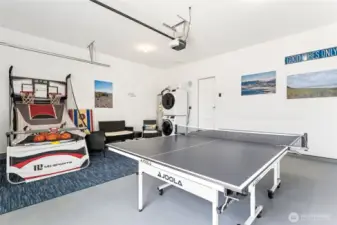 Garage transforms into a game room.