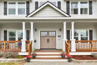 Greet your friends and family at the double-front doors and the spacious front porch