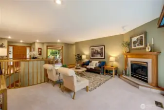 Open-concept living and dining area flows seamlessly into the kitchen—ideal for modern living in Maple Valley real estate.