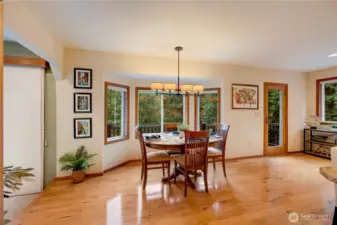 Elegant Breakfast nook with large windows—entertain in style in this beautifully appointed Maple Valley home.