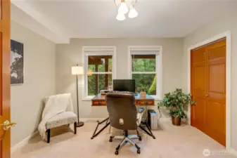 Private bedroom or home office or flex room with large window—perfect for remote work in this Maple Valley residence.