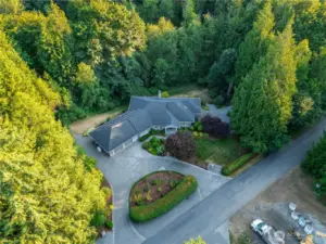Overhead view of the wooded surroundings—secluded, yet just minutes from schools, shopping, and trails in Maple Valley.