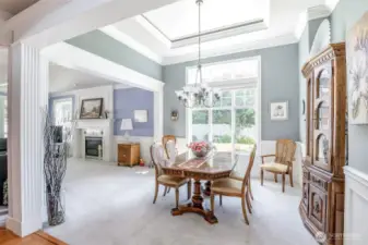 Dining room with cased opening and crown moulding
