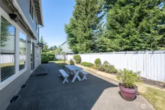 Rear patio with surround sound speakers and electric awning for shade in the ward summer months.