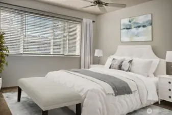 The Primary Bedroom is light and airy and you enjoy waking to morning sunshina and chirping birds. Vertually Staged.