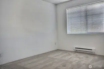Second bedroom with 72 inch wind slider door closet space. Second floor is newly carpeted.