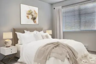 The second bedroom is bright and inviting, offering a comfortable place to unwind after a long day.  Vertually Staged