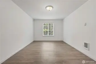 Two of three bedrooms, including primary.