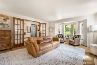 We've all learned how important it is to have private spaces. There is a family room as well, but this living room could double as an extra guest space, home office, playroom, etc