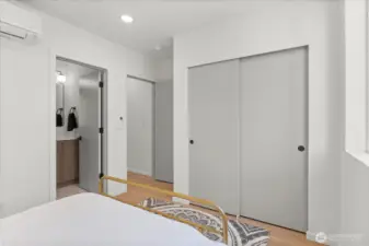 With an ensuite bath and large closet, this bedroom offers both privacy and convenience in a modern layout.