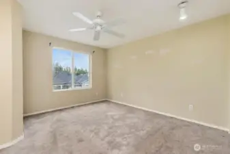 Another view of the primary bedroom.