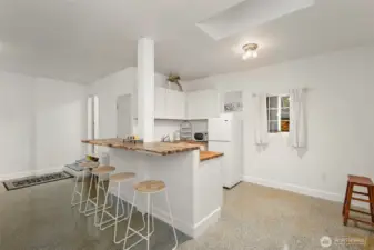 Converted 2 car garage space with kitchen...could be easily converted back to garage.